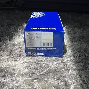 Birkenstocks, never used or worn because we ordered the wrong size.